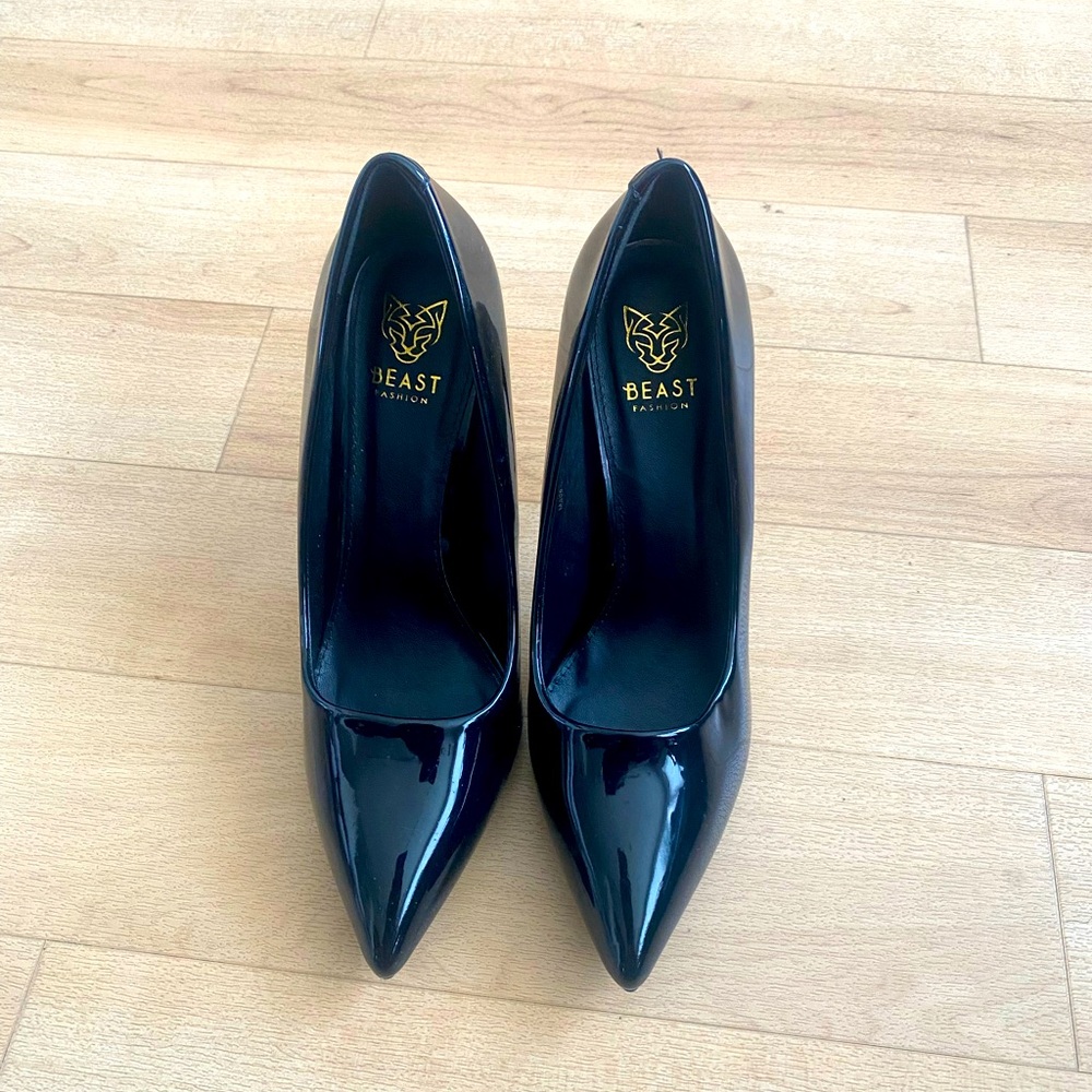 All black patent leather pumps